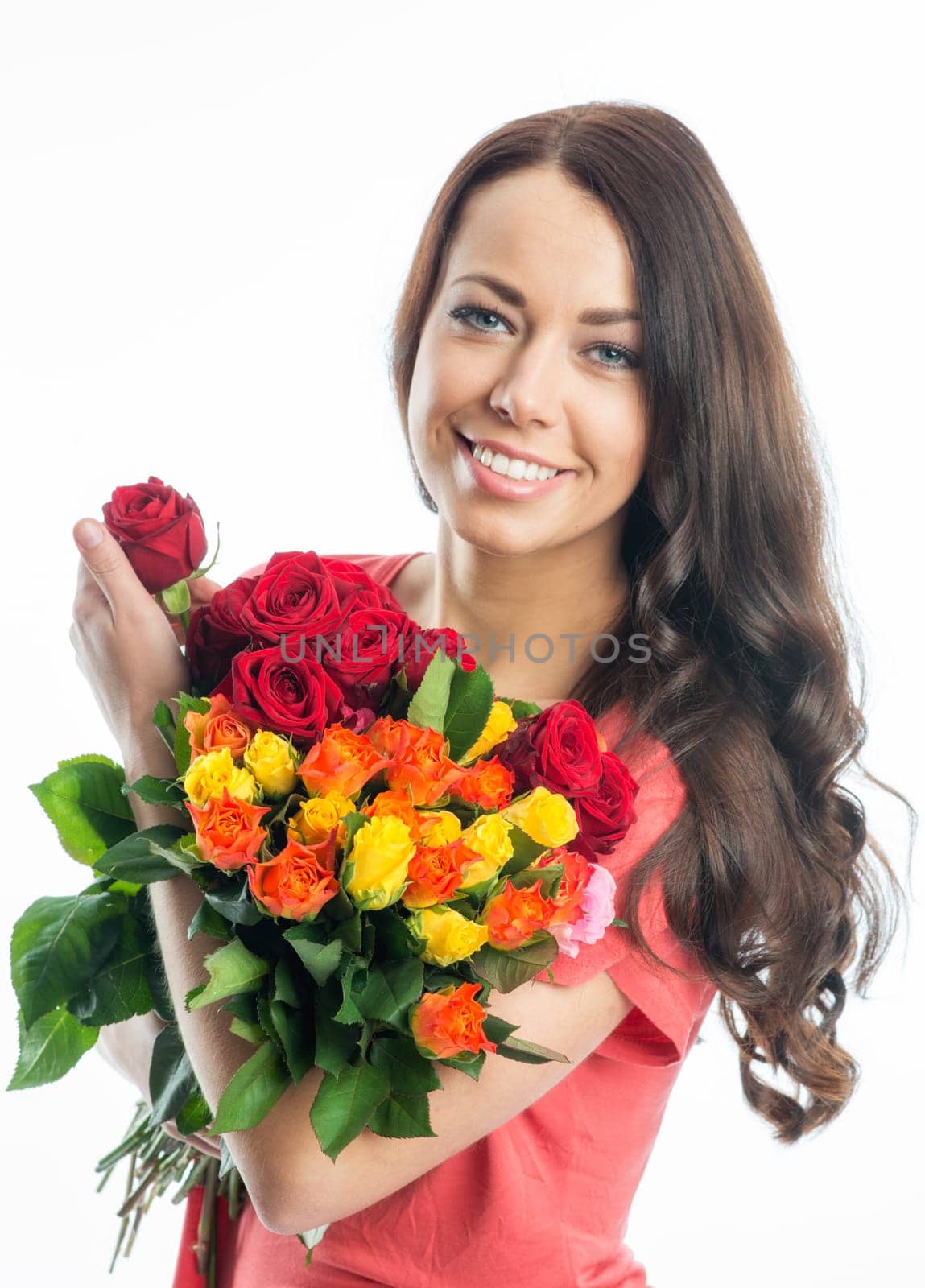 Young woman with bouquet of roses