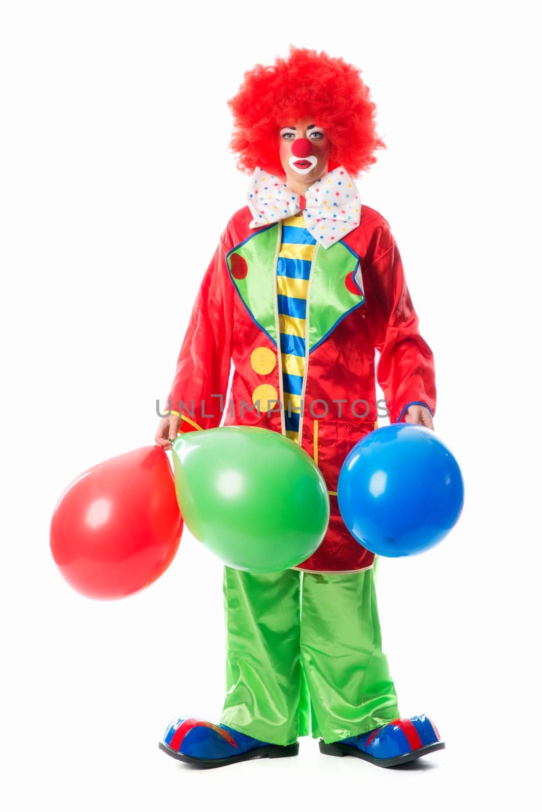 Sad clown with balloons
