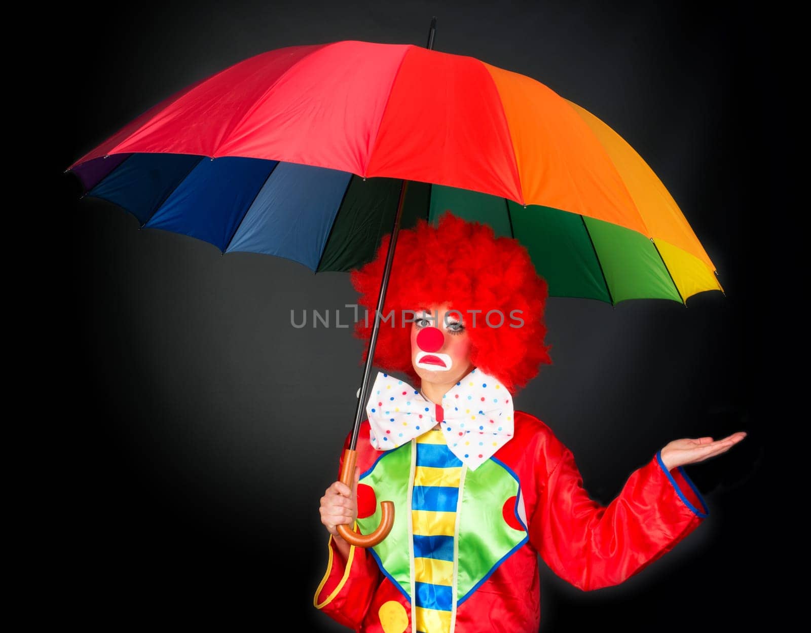 Clown with umbrella
