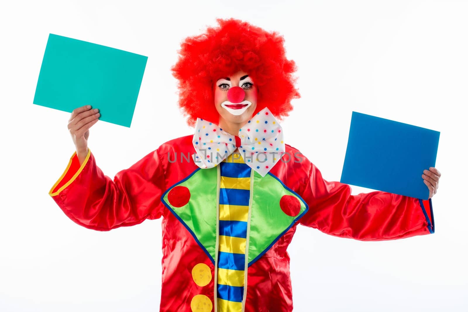 Clown holds cardboard cards