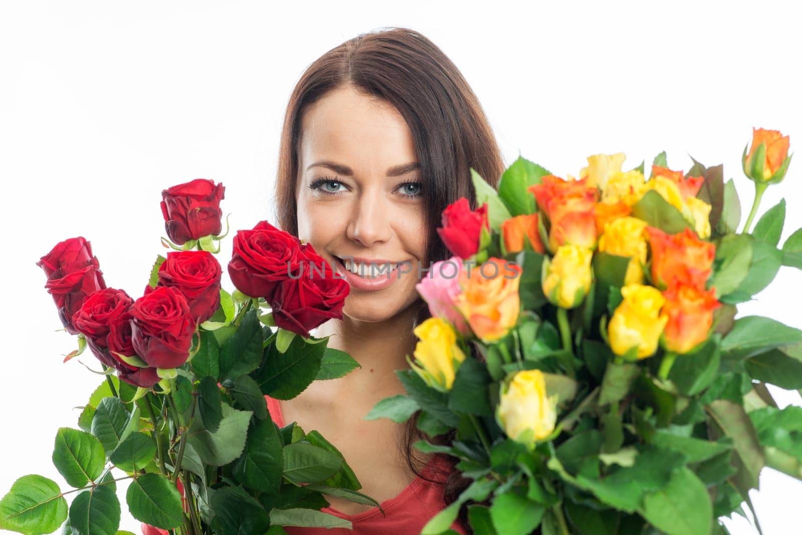 Young woman with bouquets of roses