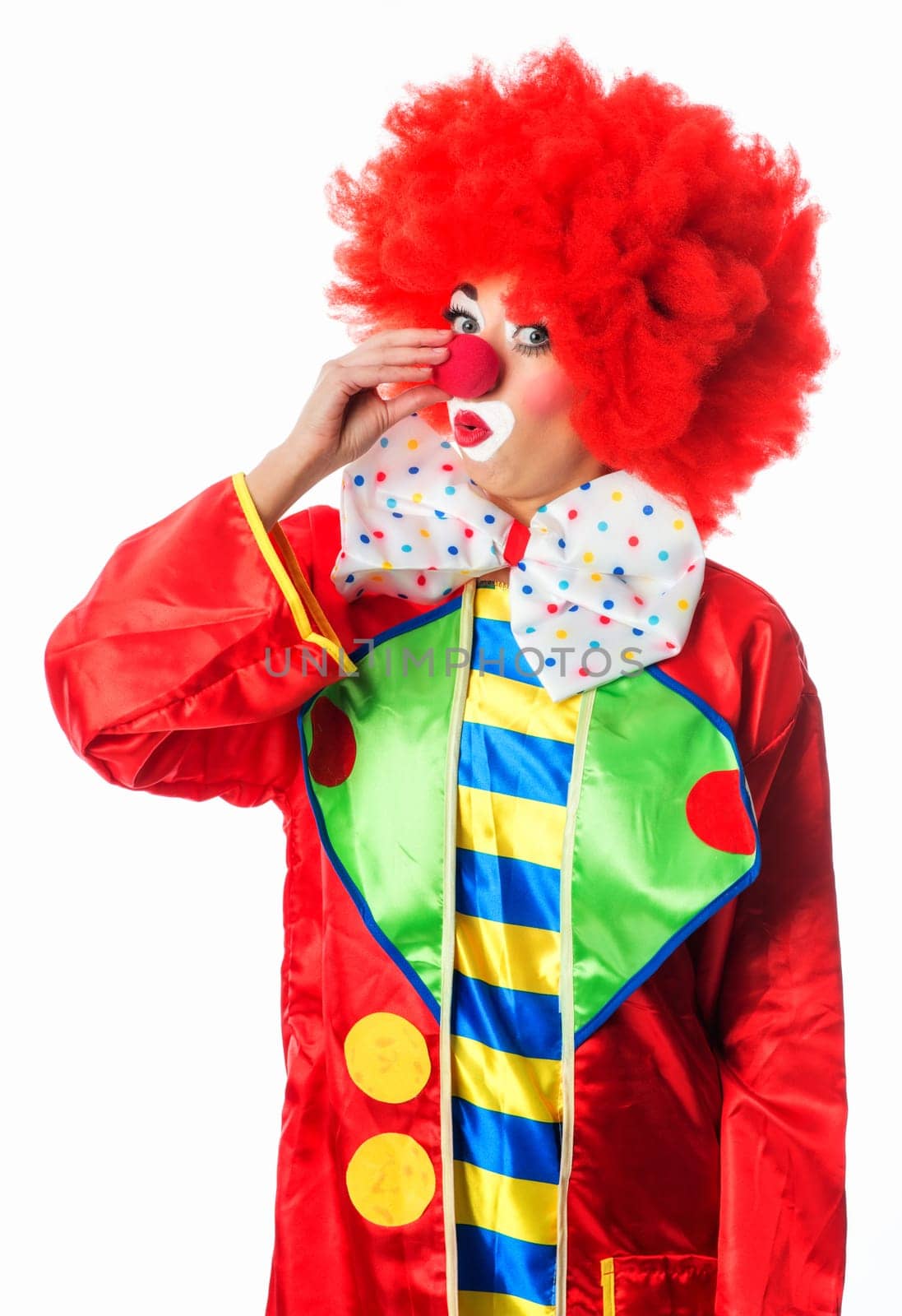 Clown grabs his nose