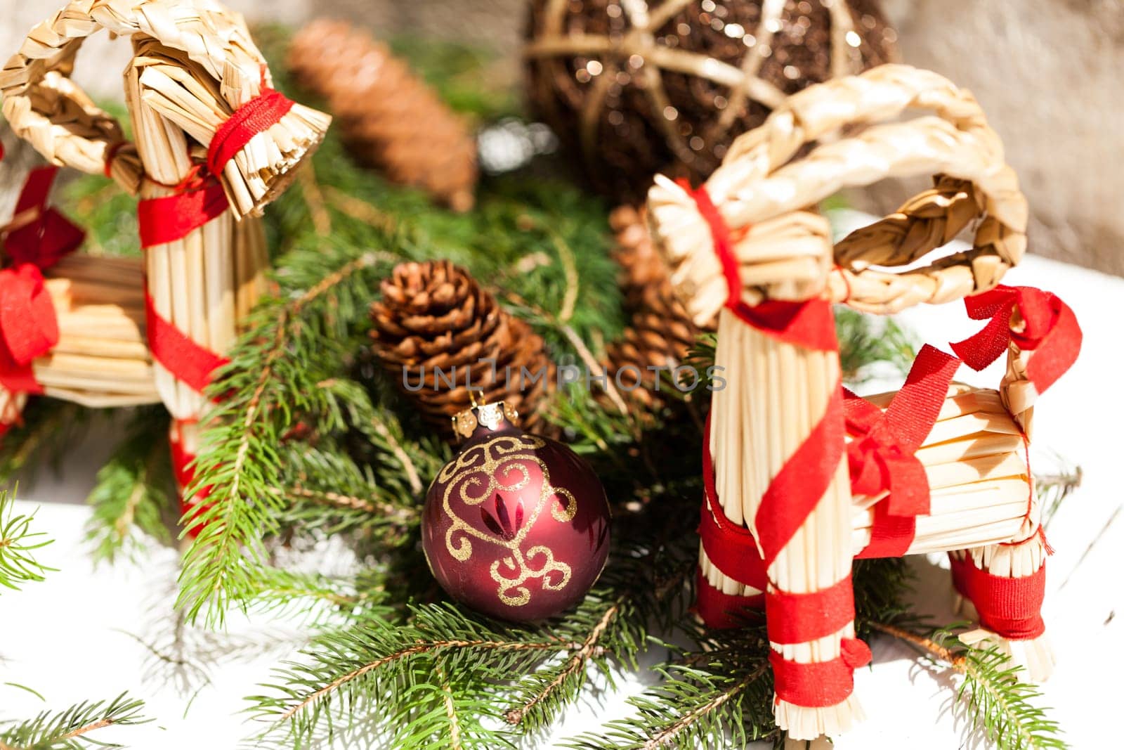 red Christmas tree ornament sembrightly decoration for Christmas with golden ornaments as macro detail