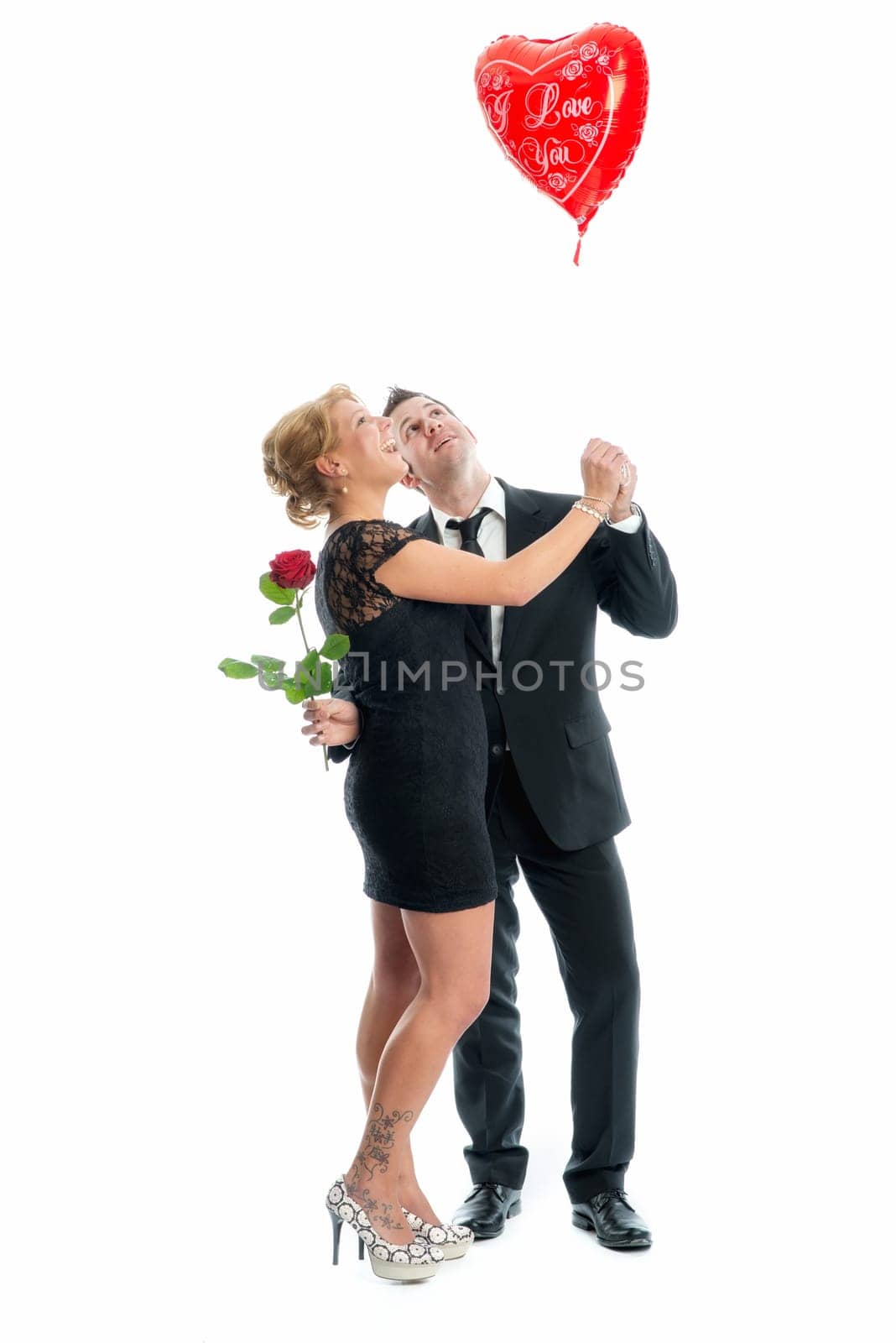 In love couple with heart balloon