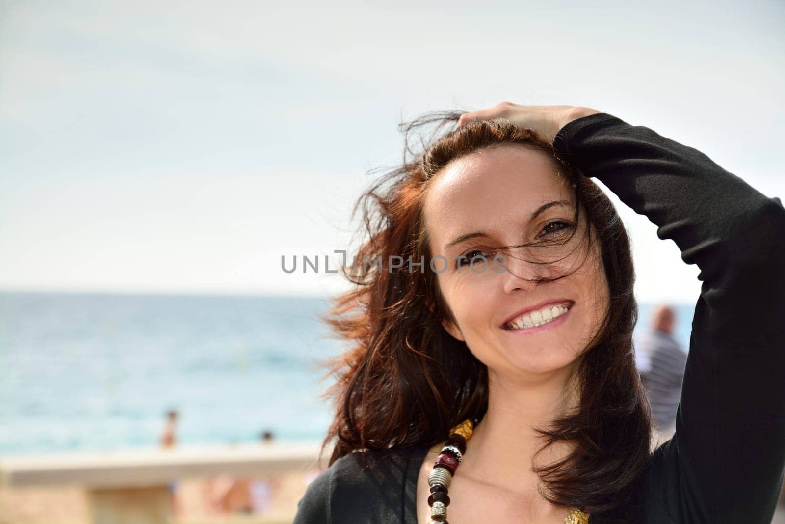 Cute woman walking and enjoying on the beach