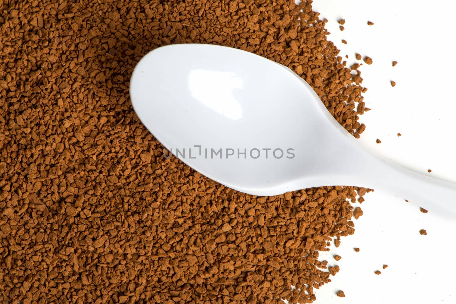 Instant coffee with plastic spoon