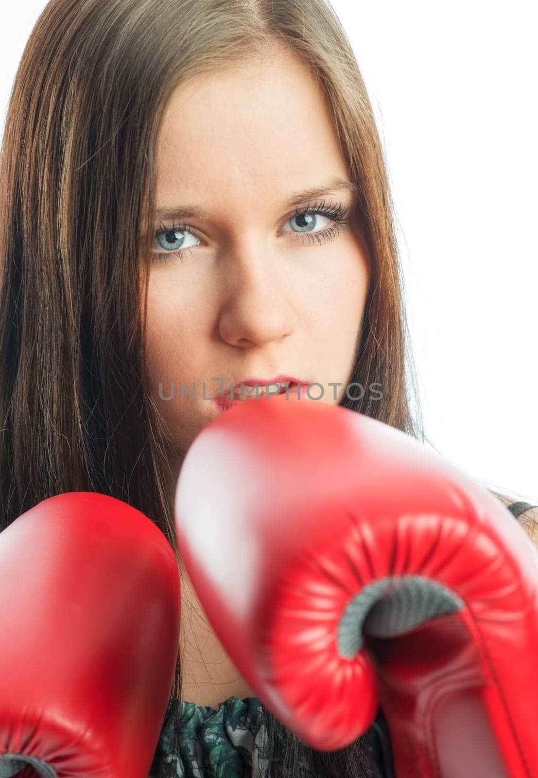 Young girl with boxing gloves