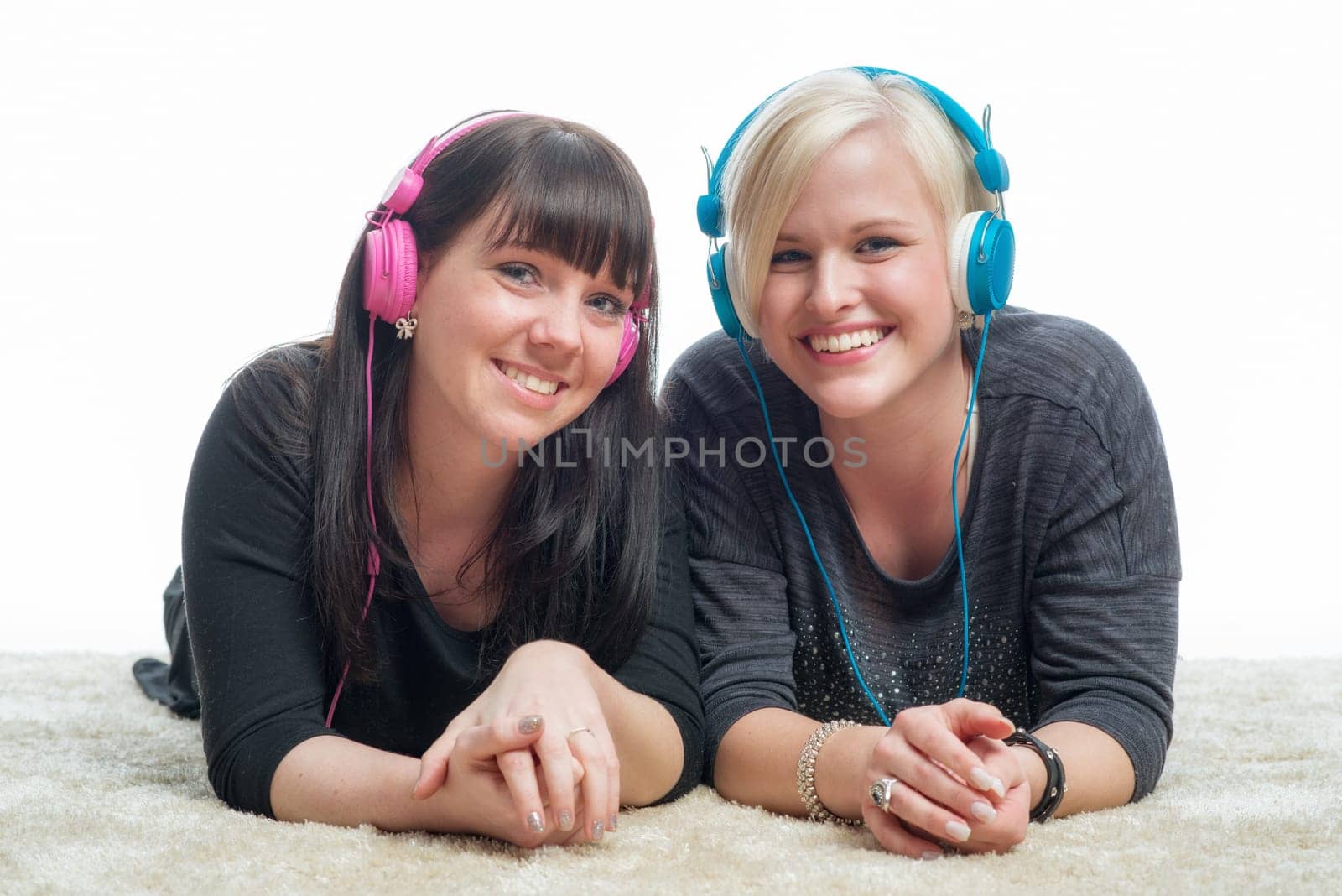 Girlfriends with headphones