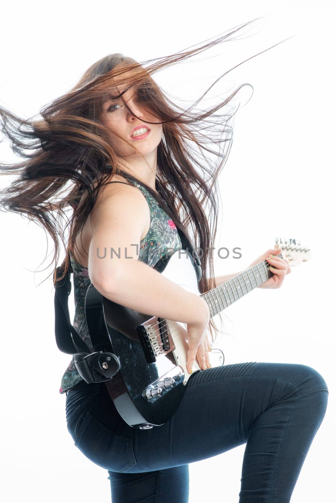 Young girl with electric guitar