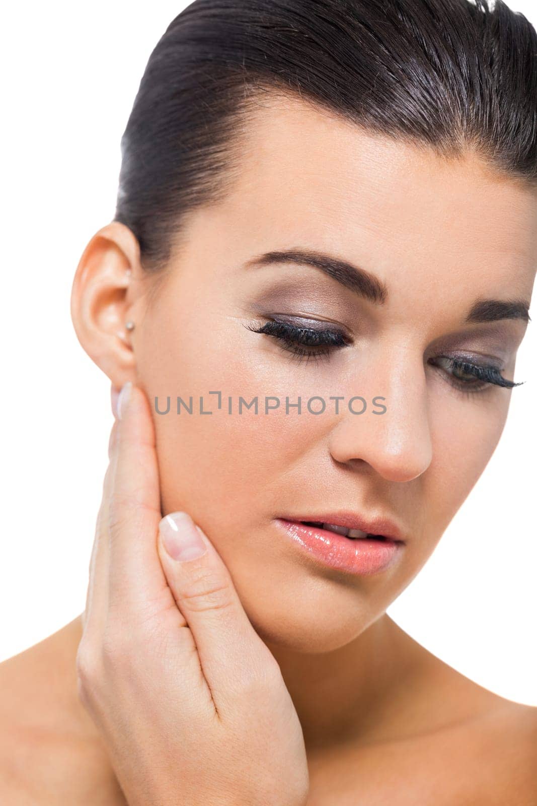 natural beautiful young woman with pure skin and dark hair isolated portrait cosmetic makeup care