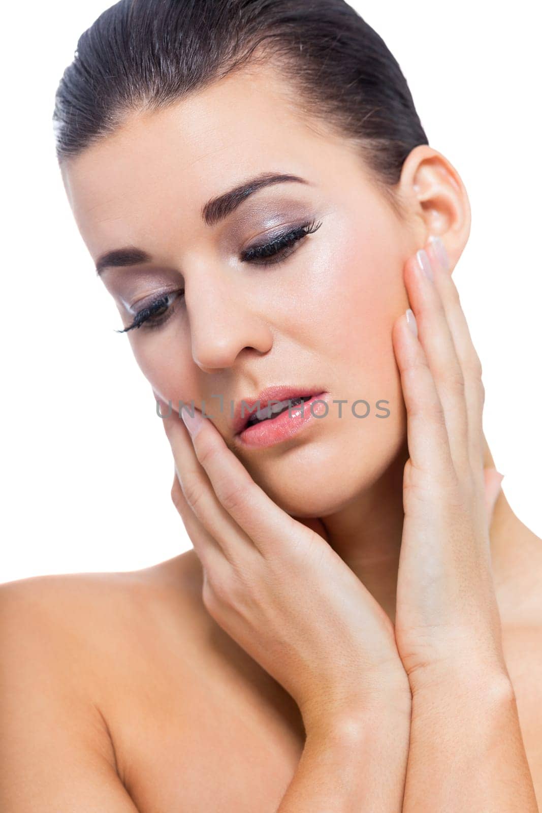 natural beautiful young woman with pure skin and dark hair isolated portrait cosmetic makeup care