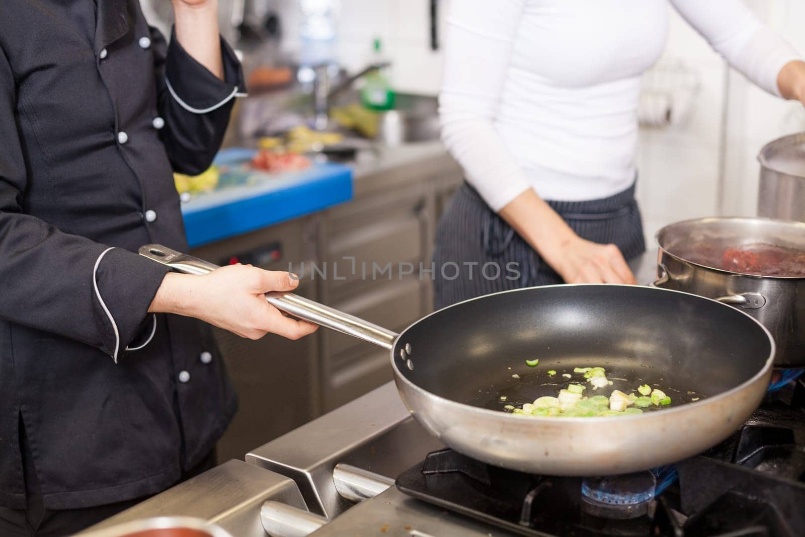 preparation of dinner in the kitchen restaurant close-up detail work cook