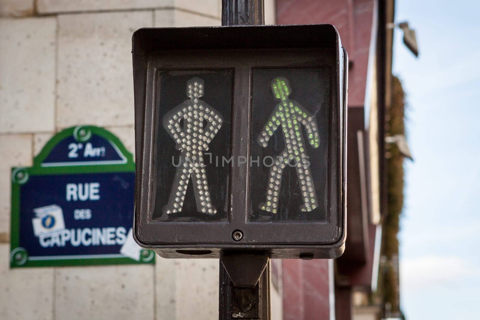 Traffic lights for pedestrians as a close-up in Paris