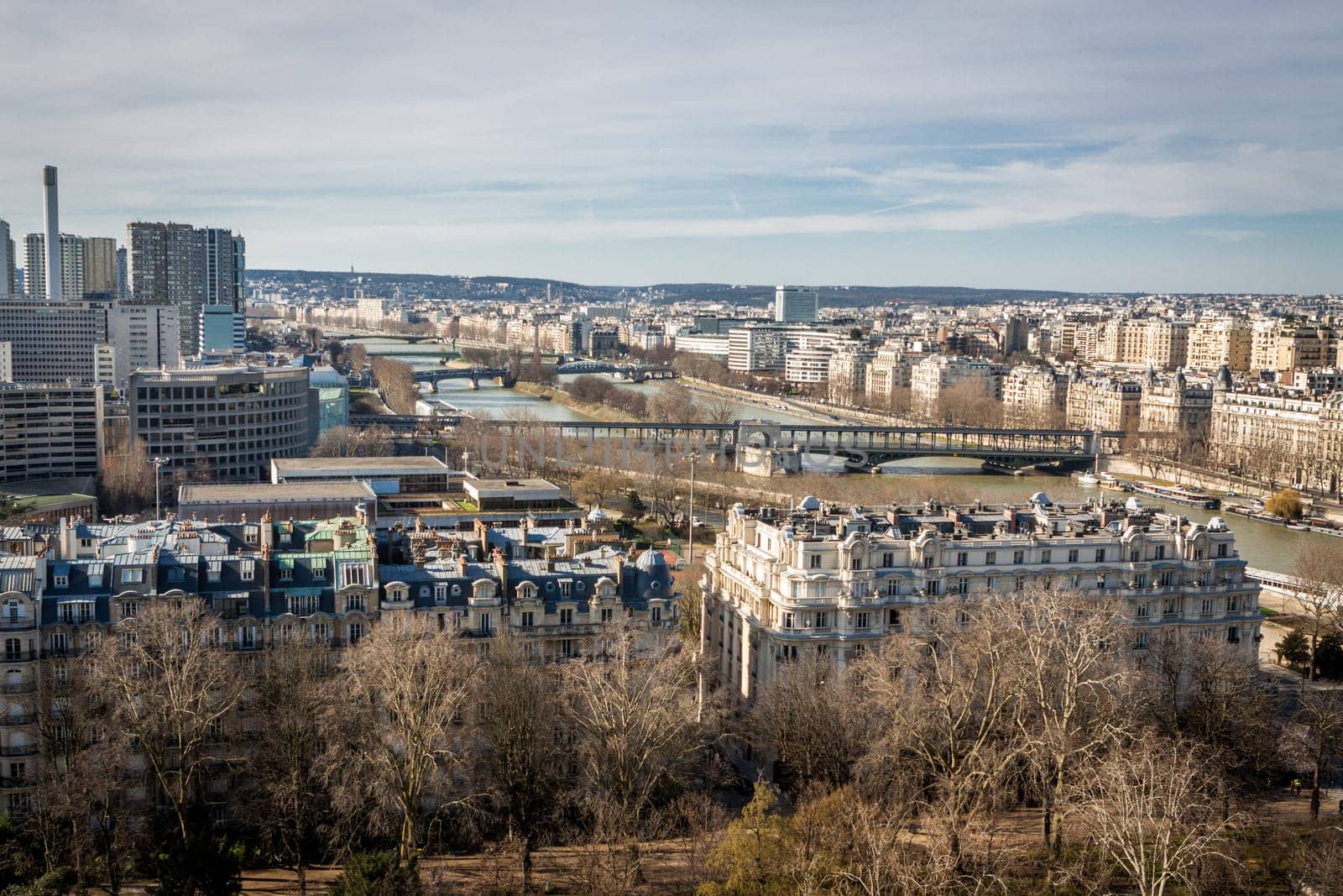 Skyline of Paris with cityscape on the Saine with blue sky in summer