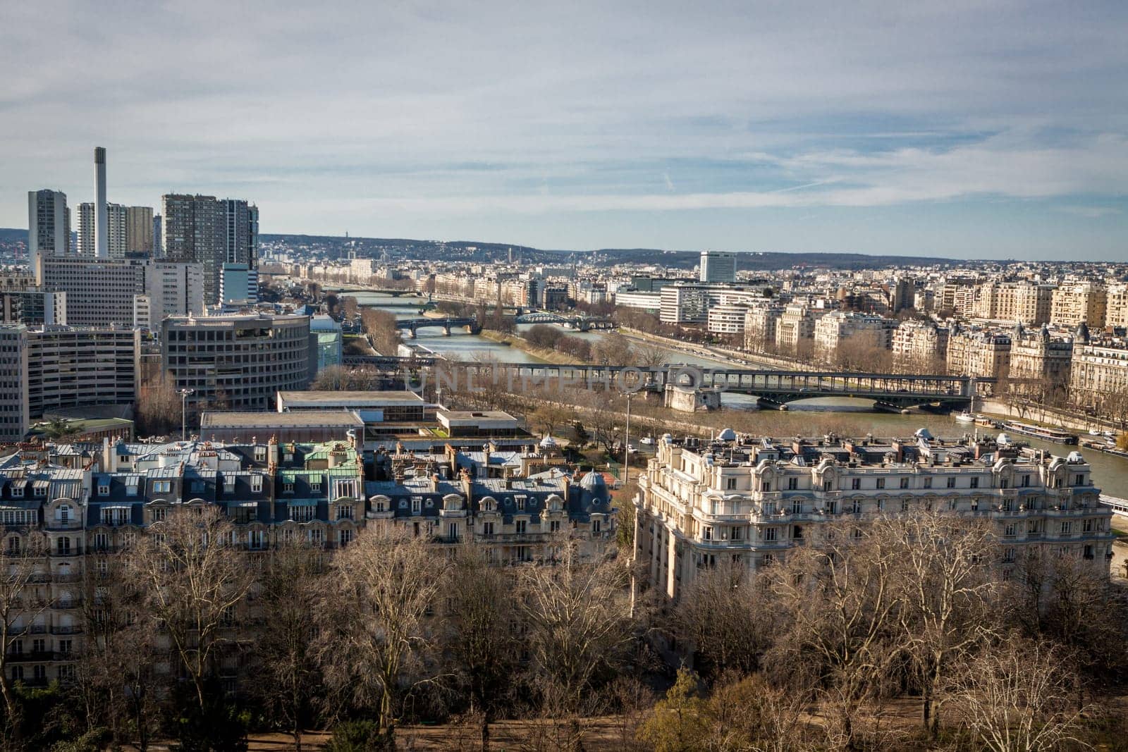 Skyline of Paris with cityscape on the Saine with blue sky in summer