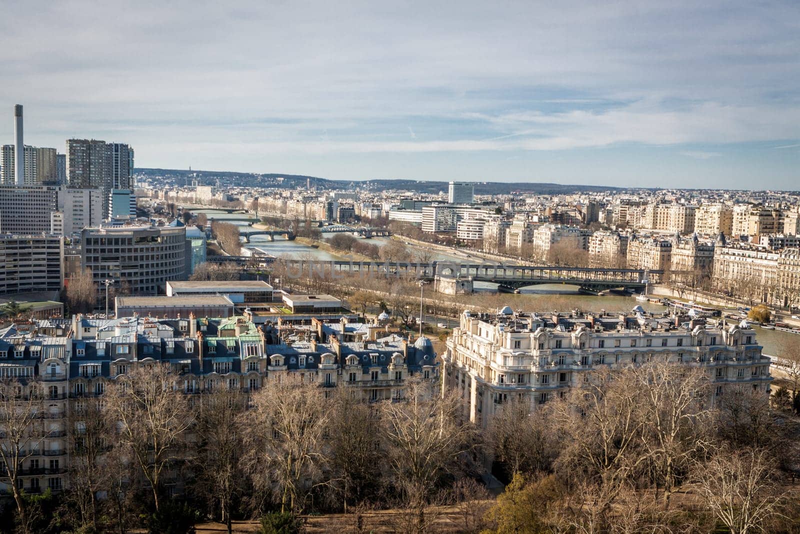 Skyline of Paris with cityscape on the Saine with blue sky in summer