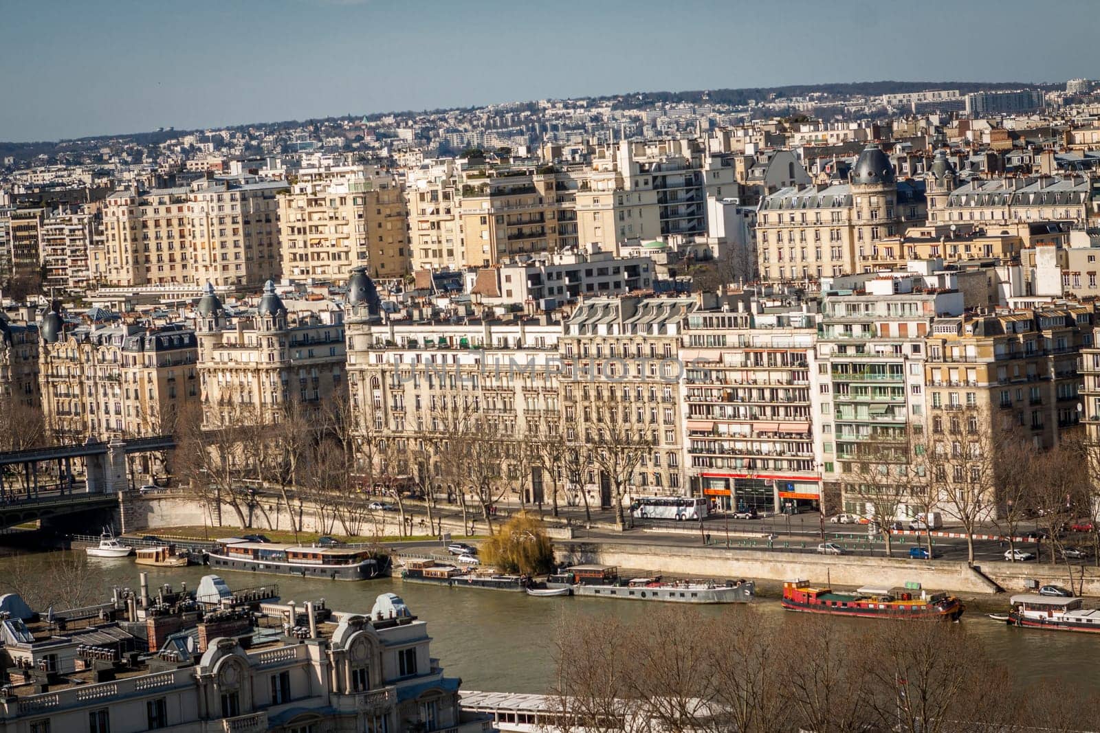 Skyline of Paris with cityscape on the Saine with blue sky in summer