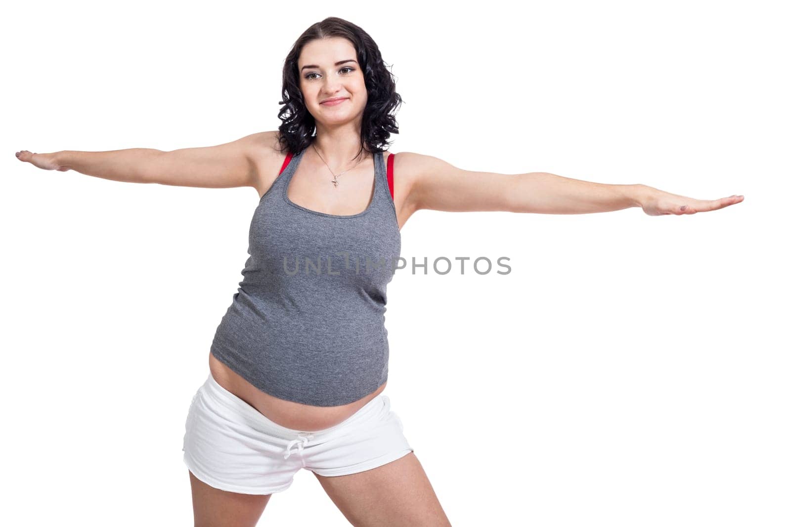 Young attractive mother in swing at training isolated against white background