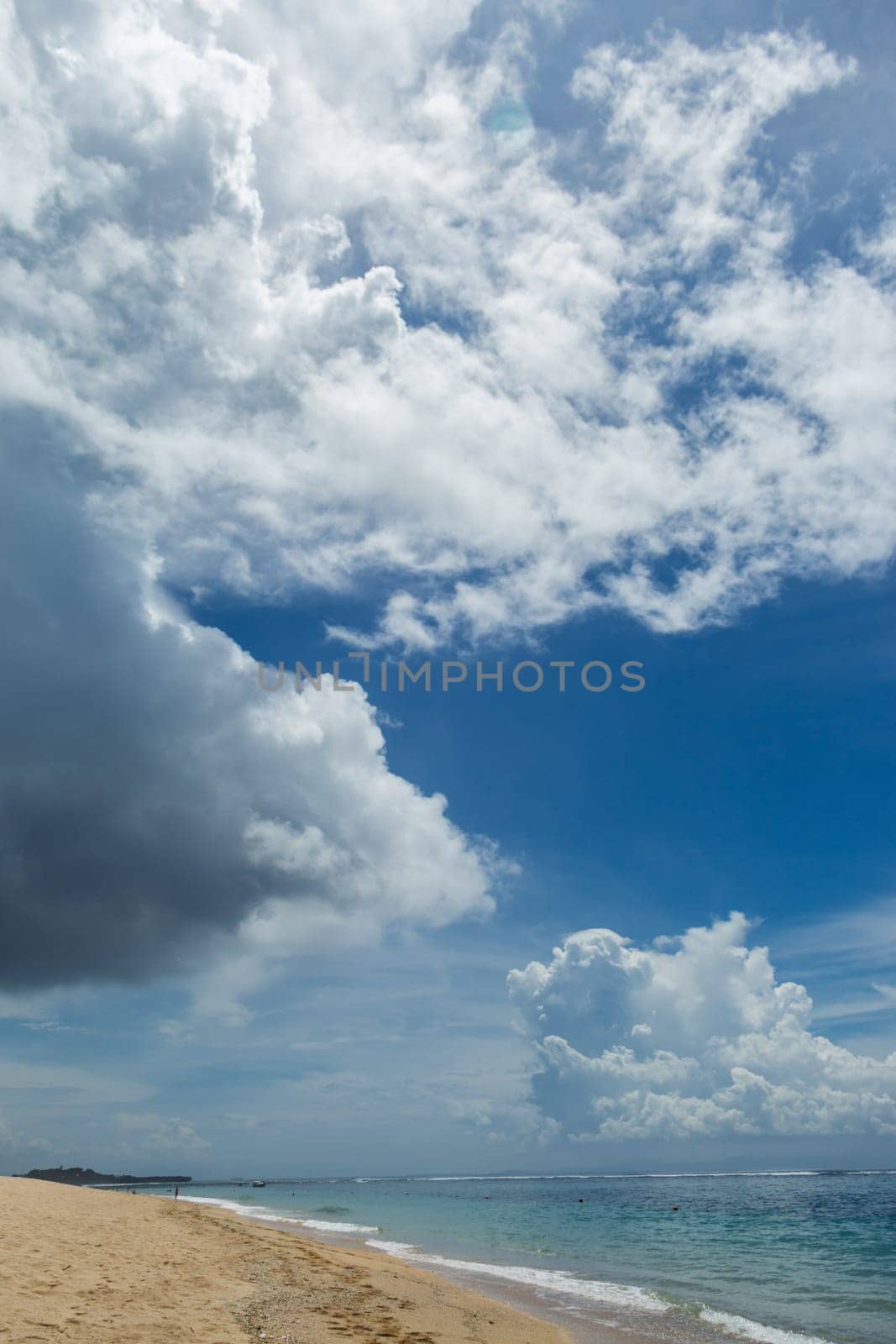 Beautiful secluded sandy beach in the Caribbean with white sand and blue sky as in paradise