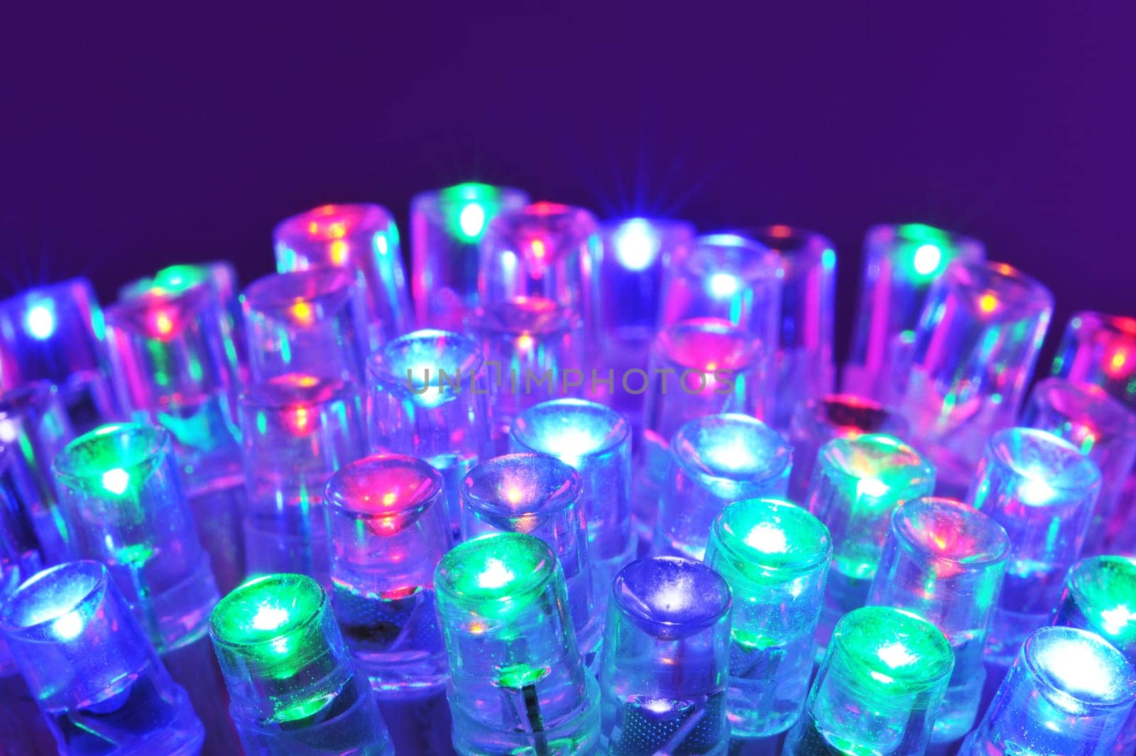 Macrodetail of some colored LEDs in violet light