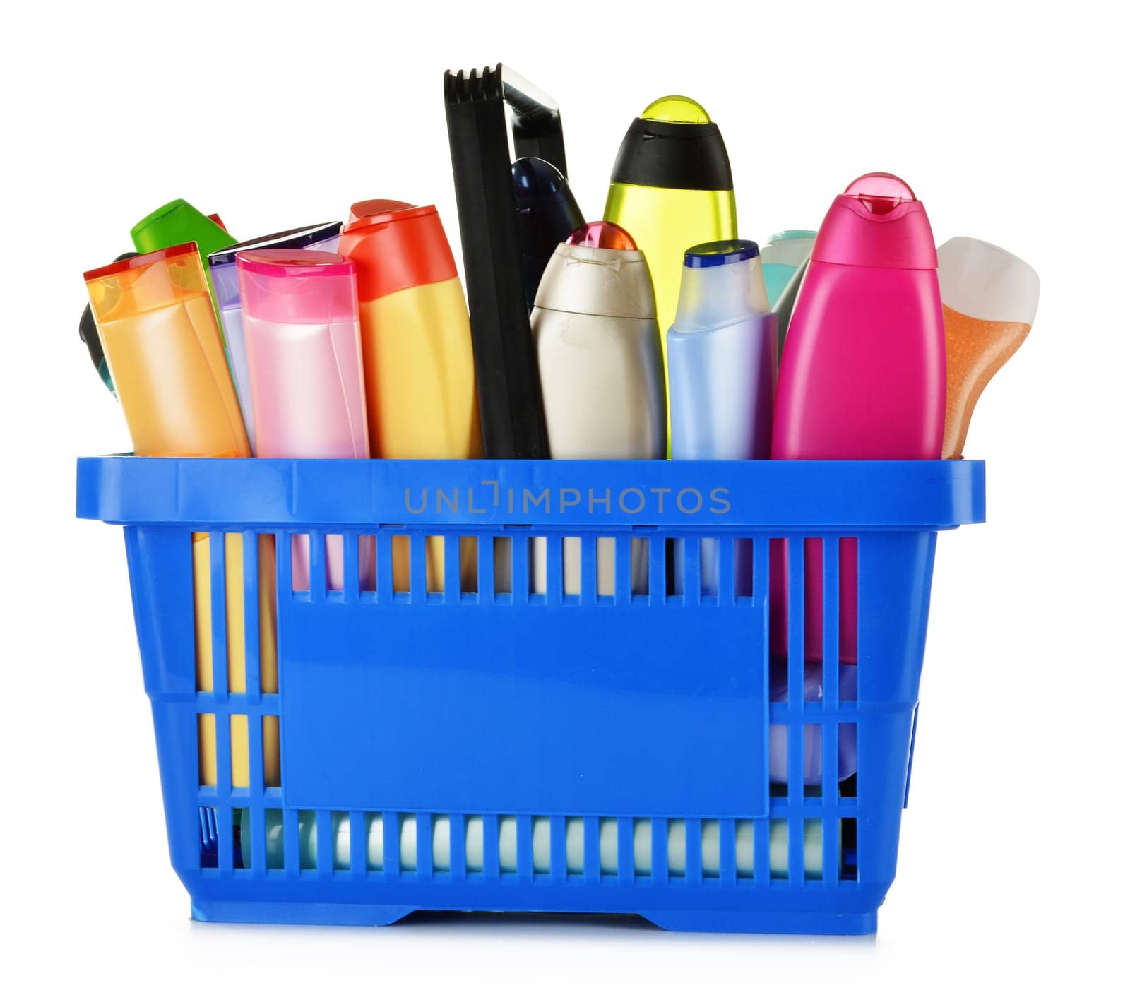 Plastic shopping basket with plastic bottles of body care and beauty products