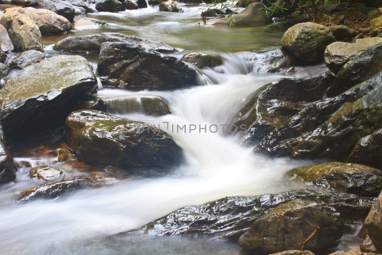 Nature waterfall in deep forest, in national park Thailand