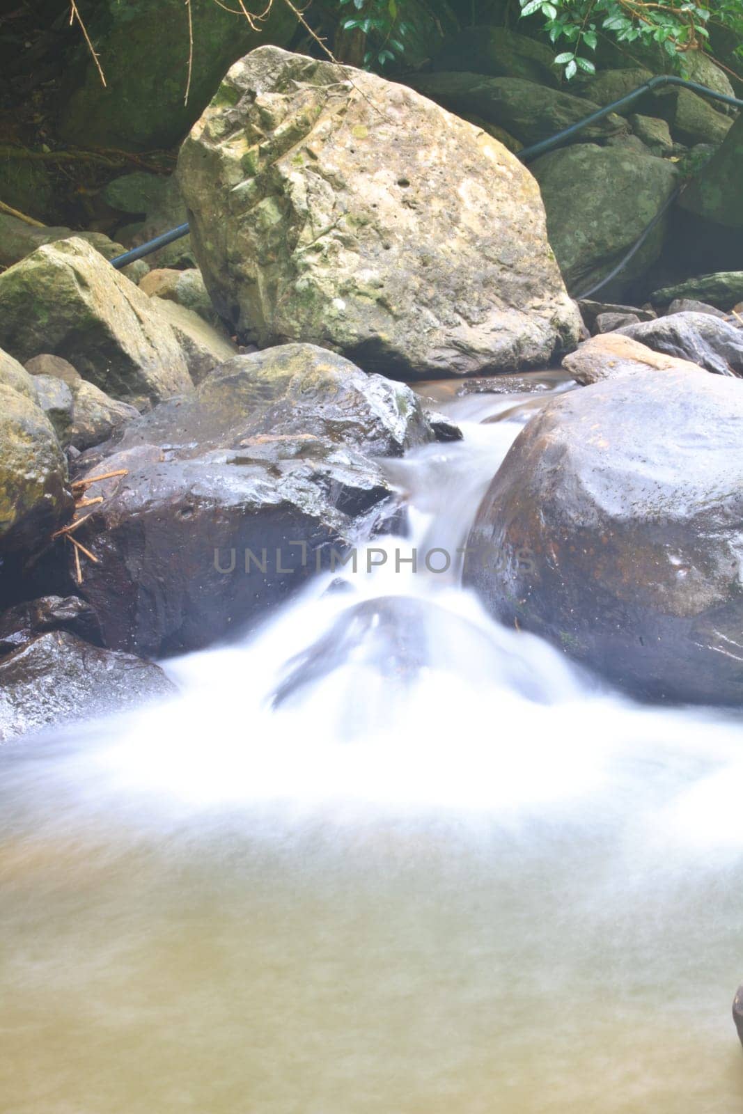 Nature waterfall in deep forest, in national park Thailand
