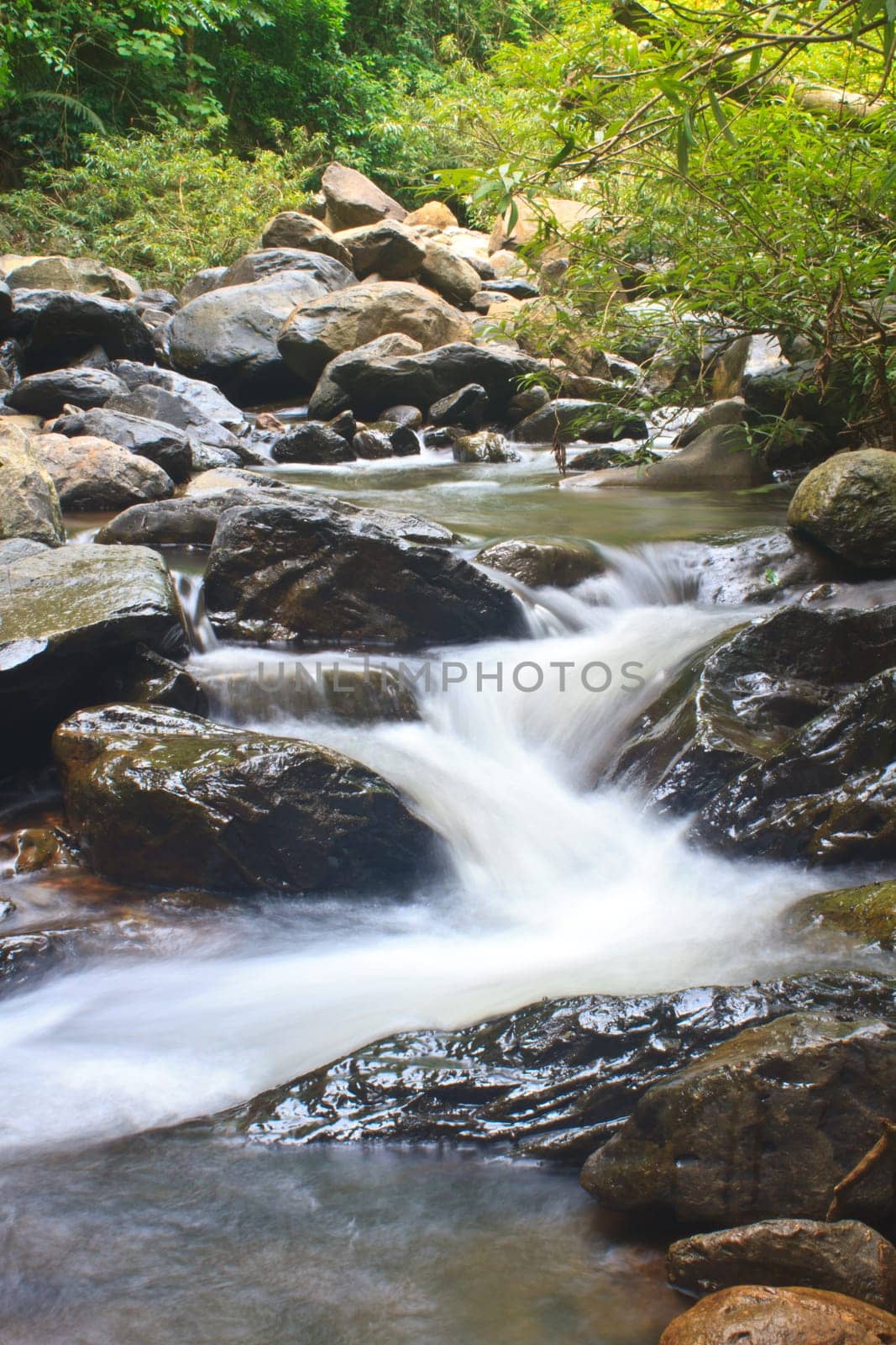 Nature waterfall in deep forest, in national park Thailand