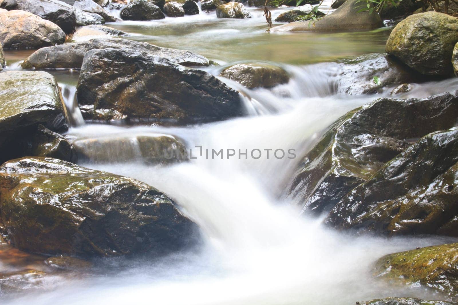 Nature waterfall in deep forest, in national park Thailand