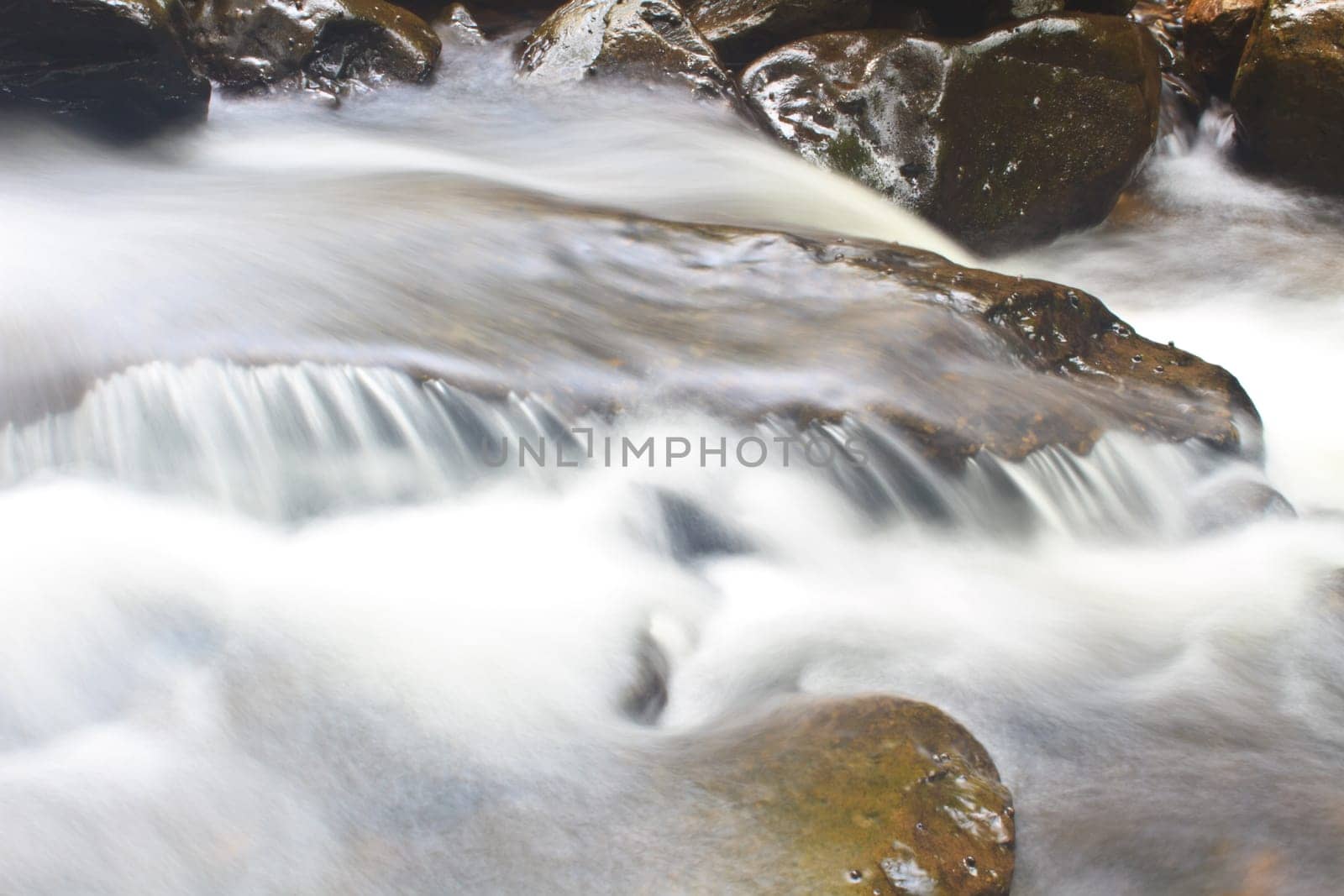 Nature waterfall in deep forest, in national park Thailand