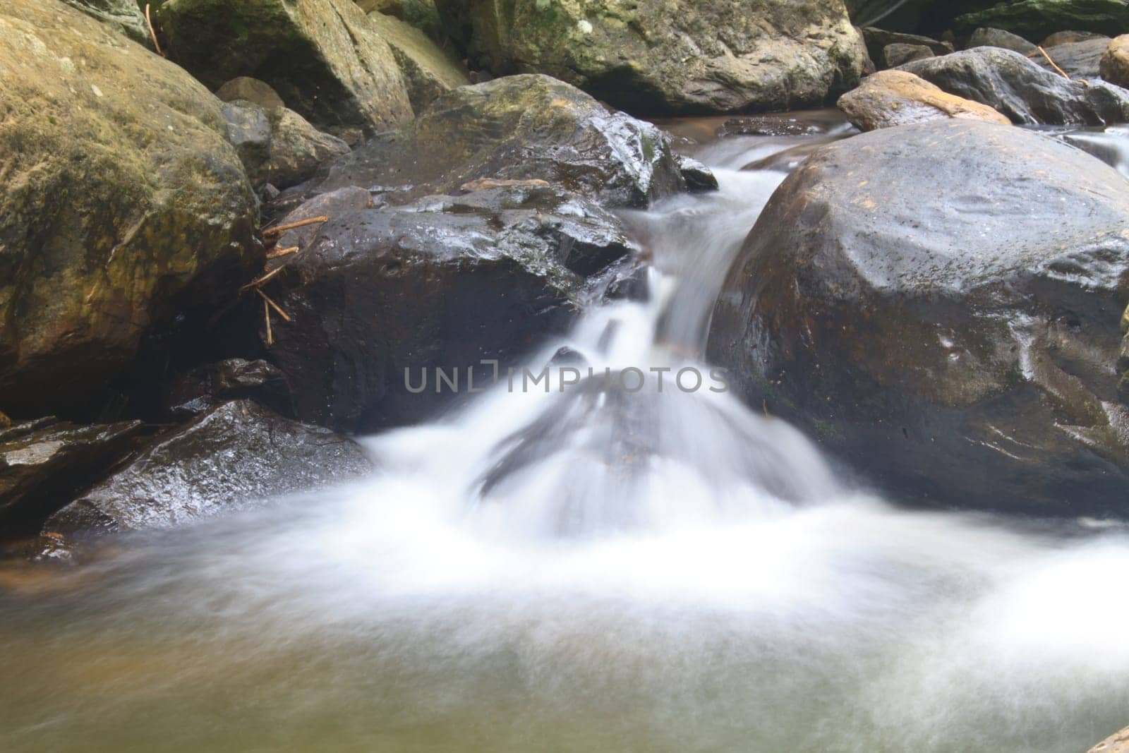 Nature waterfall in deep forest, in national park Thailand