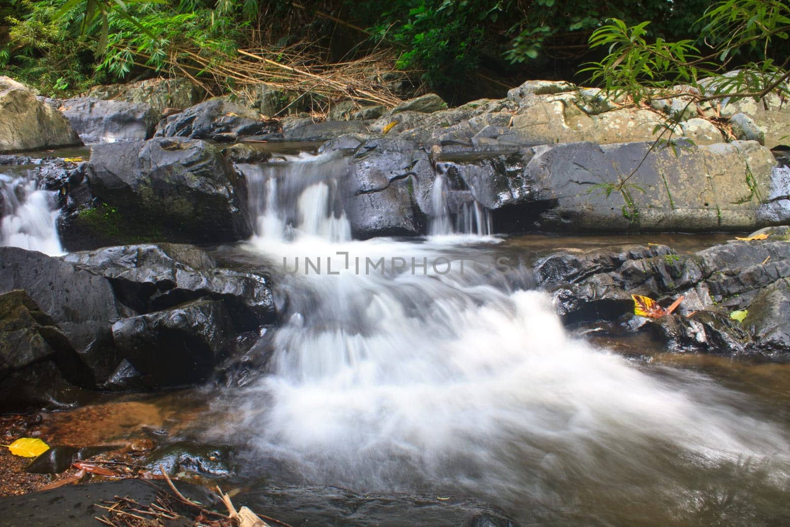Nature waterfall in deep forest, in national park Thailand