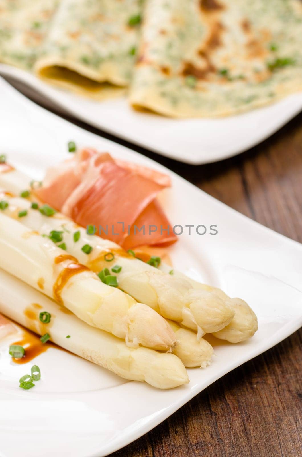 White asparagus mt chime and Parma ham in portrait format