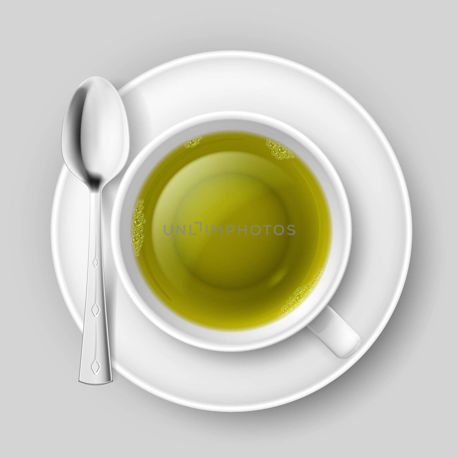 Cup of green tea with spoon over grey background
