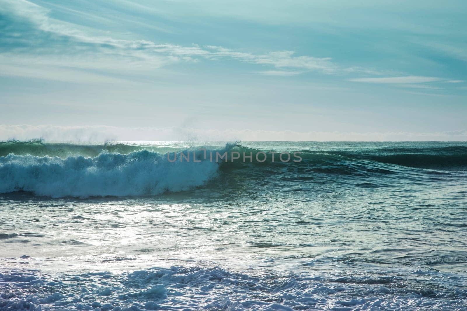Beautiful surf in the early morning with waves coming in