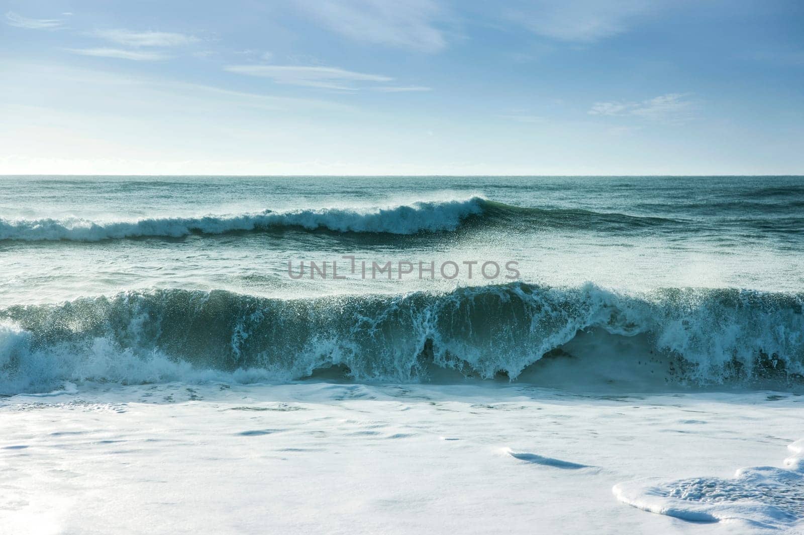 Beautiful surf in the early morning with waves coming in