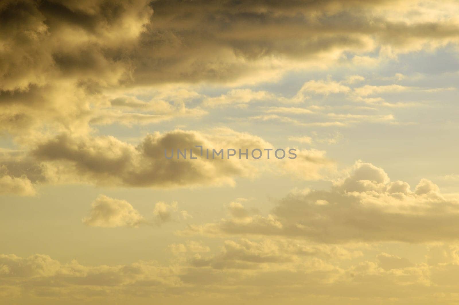 Cloudscape, Colored Clouds at Sunset near the Ocean