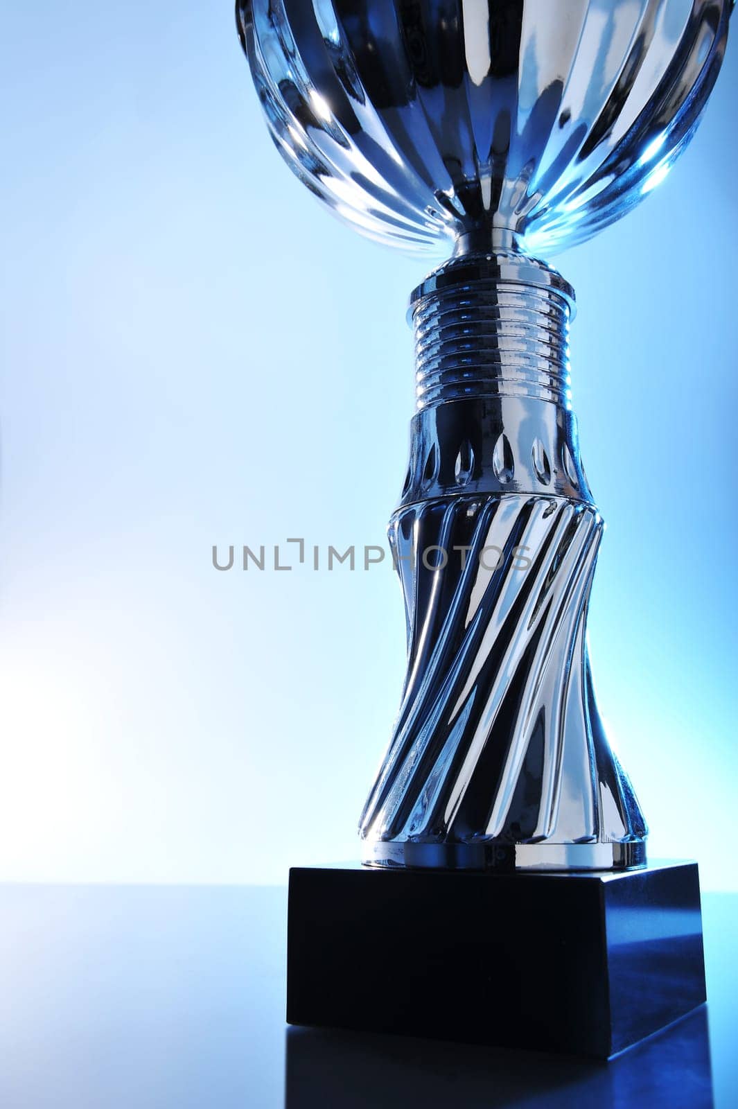 Detailed view of a chrome-plated cup in a special light