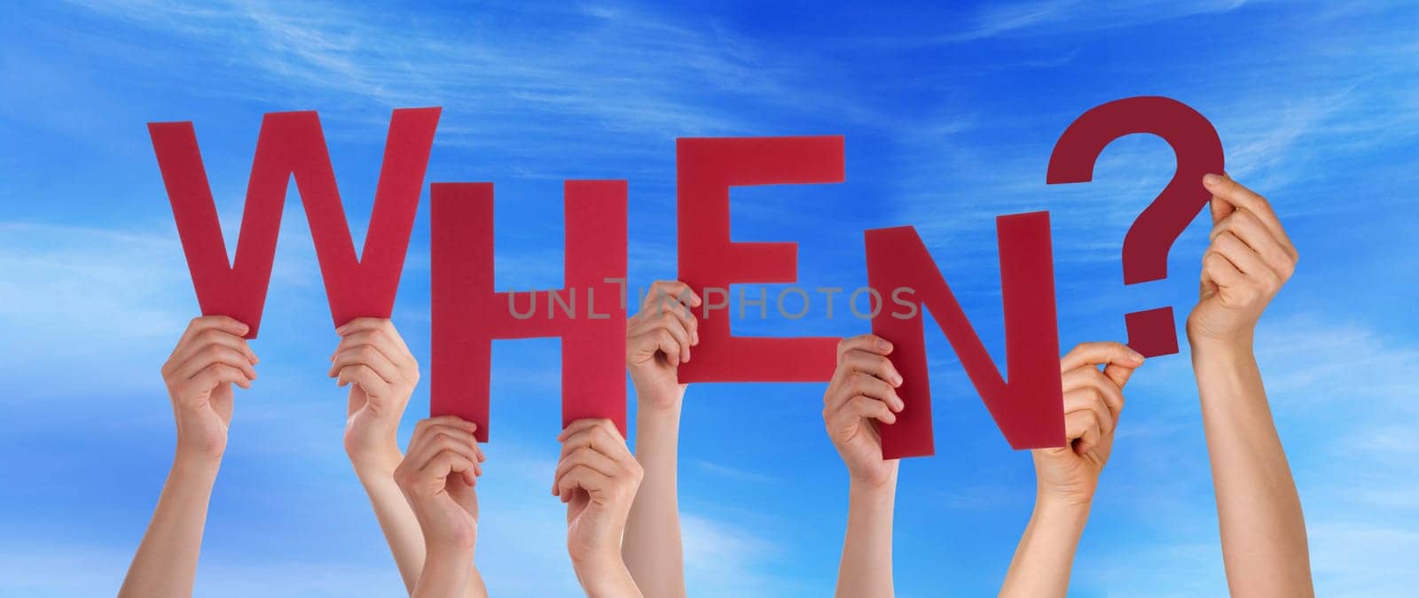 hands holding four pieces of a puzzle with copy space, gray background