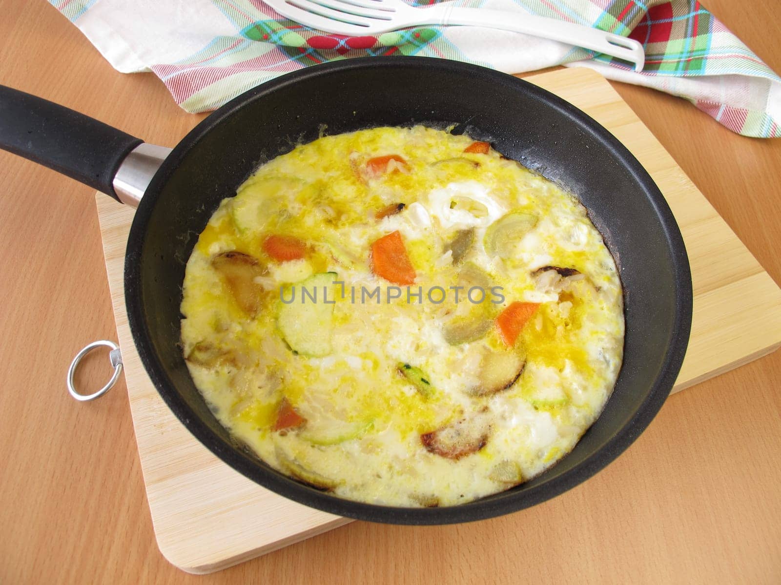 Rice tortilla in the pan