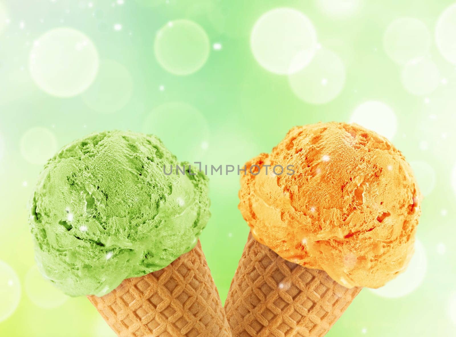 Kiwi and mango Ice cream in the cone with abstract light background.