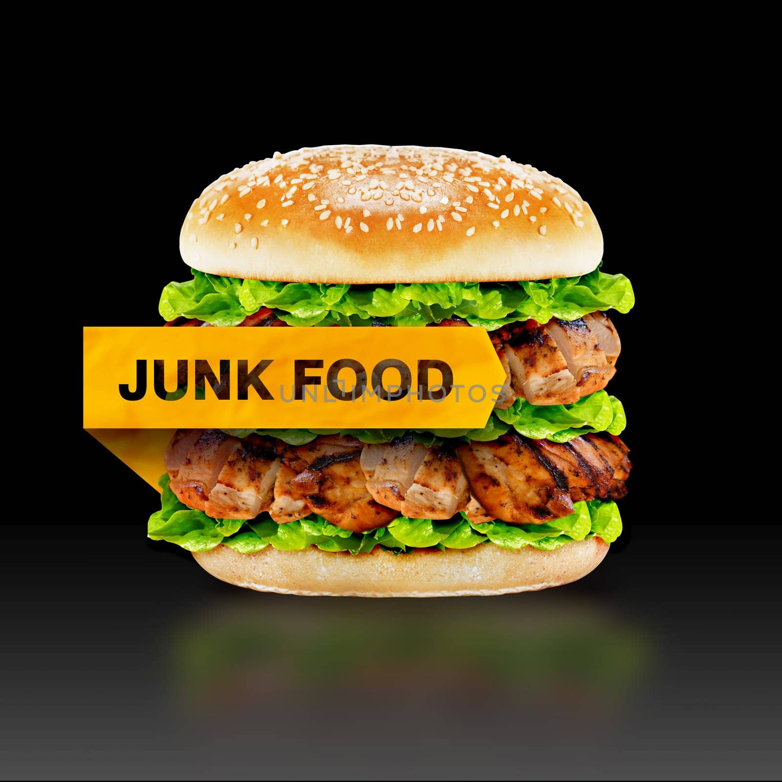 Junk Food, burger with warning message on black background with clipping path.