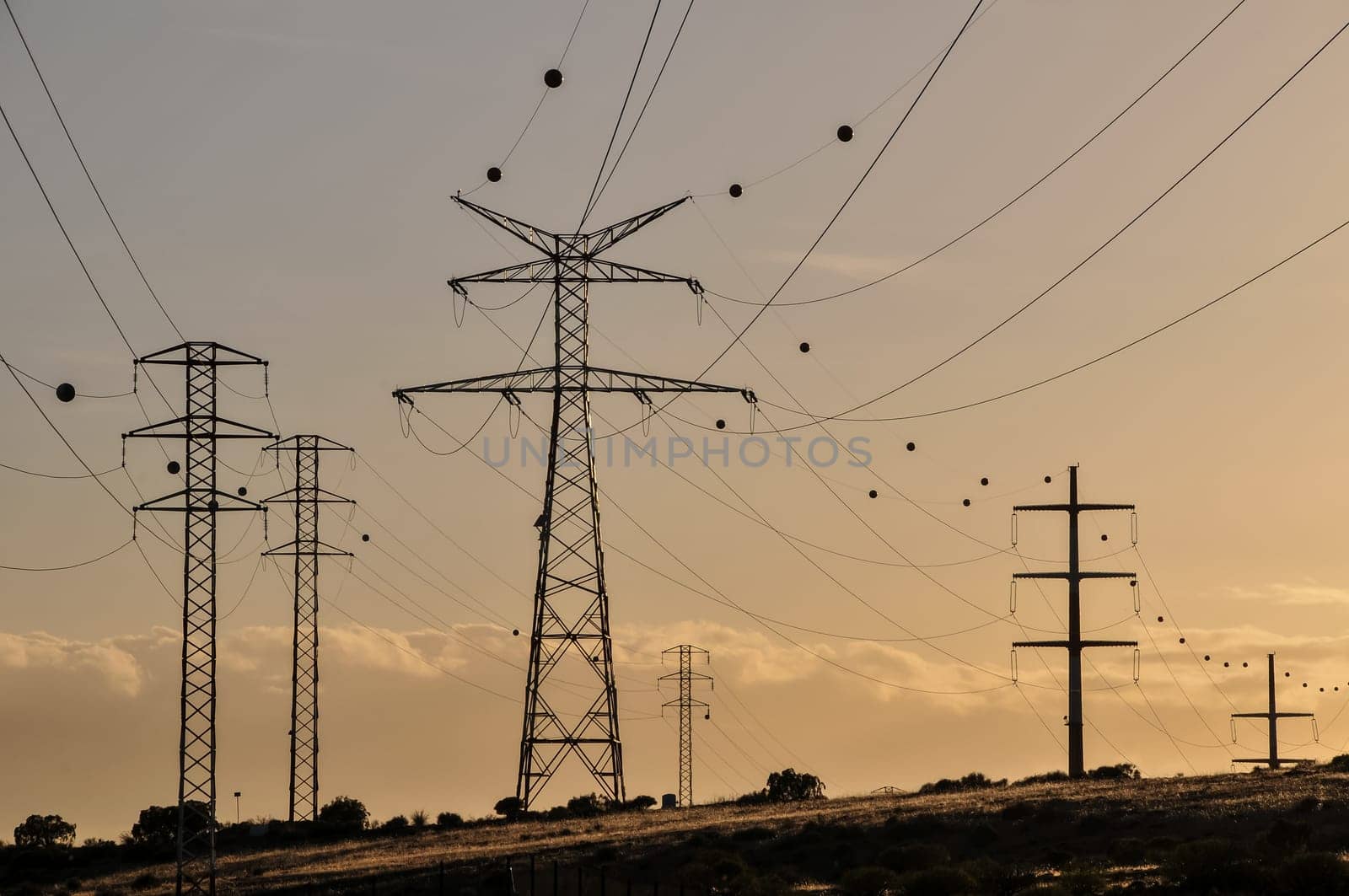 Energy Electricity Power Pylon on a Blue Sky