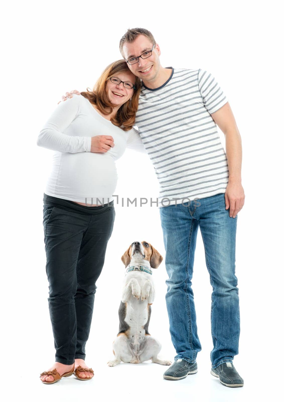 Expectant parents with dog