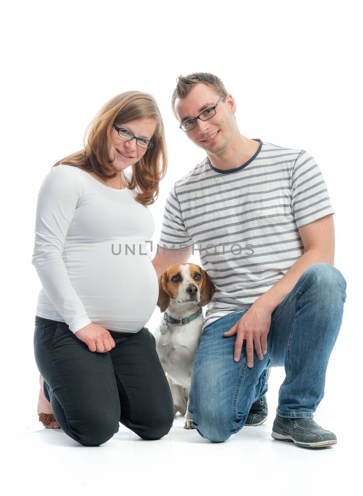 Expectant parents with dog