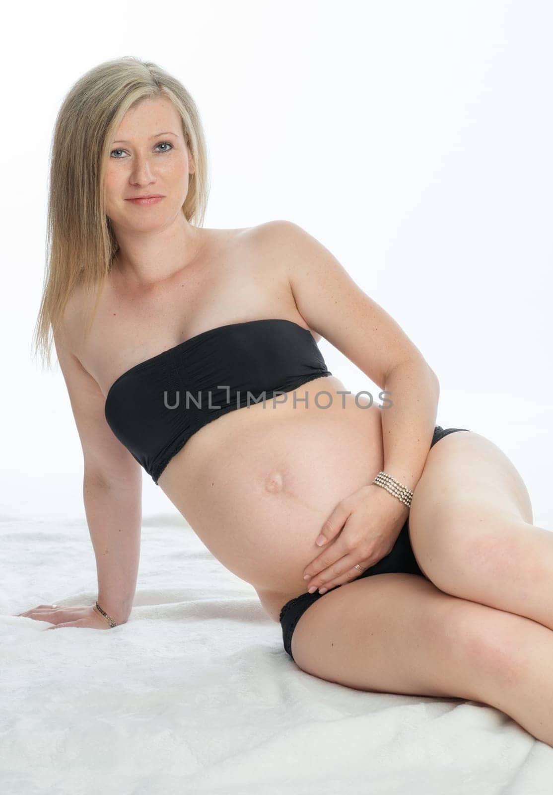Pregnant woman in underwear