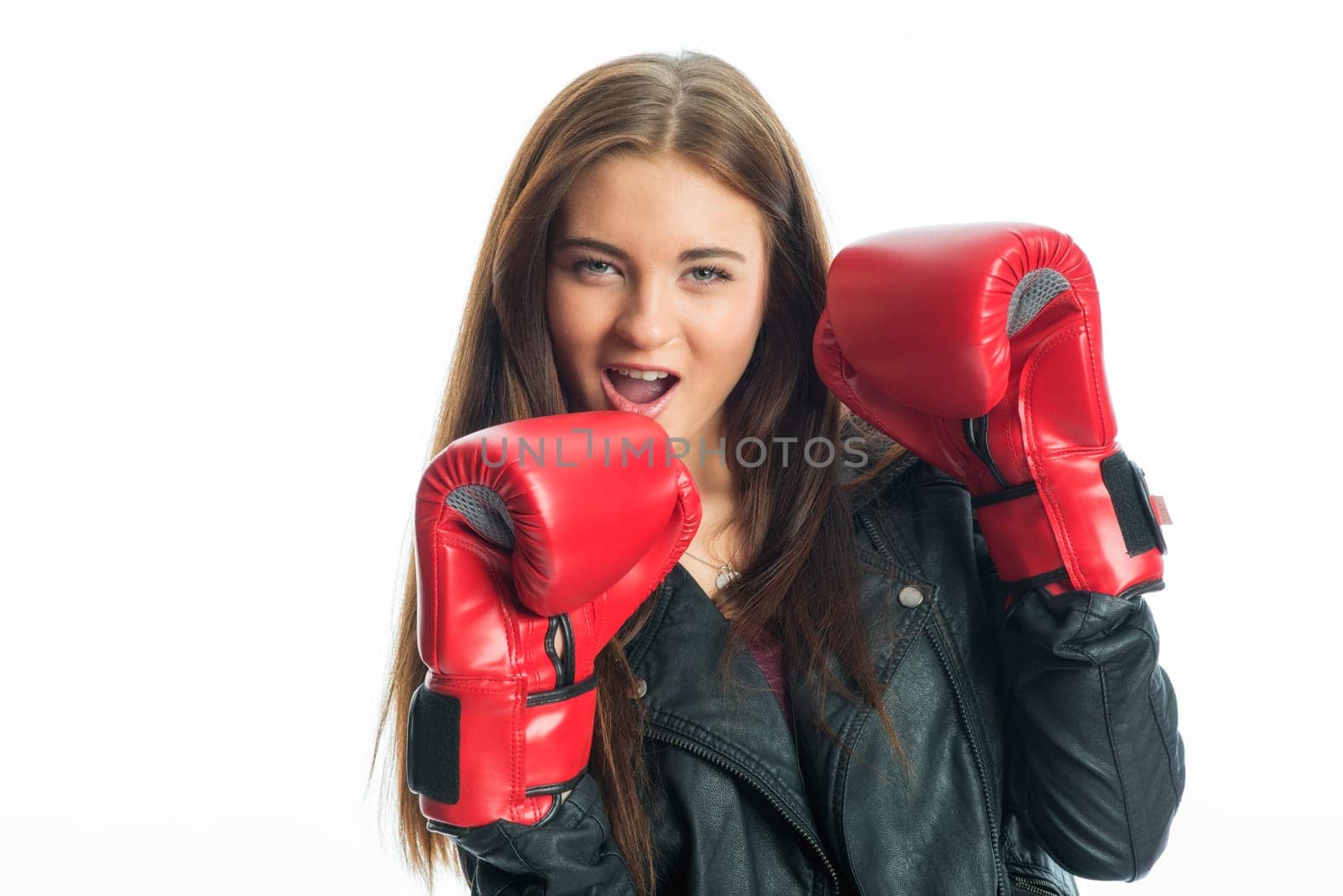 Young girl with boxing gloves
