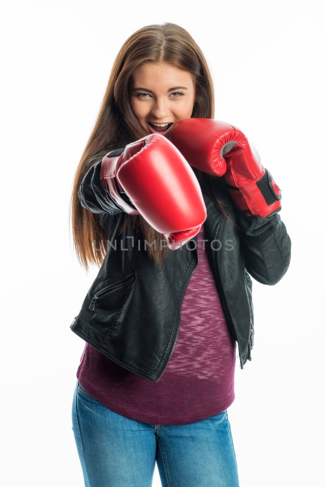 Young girl with boxing gloves