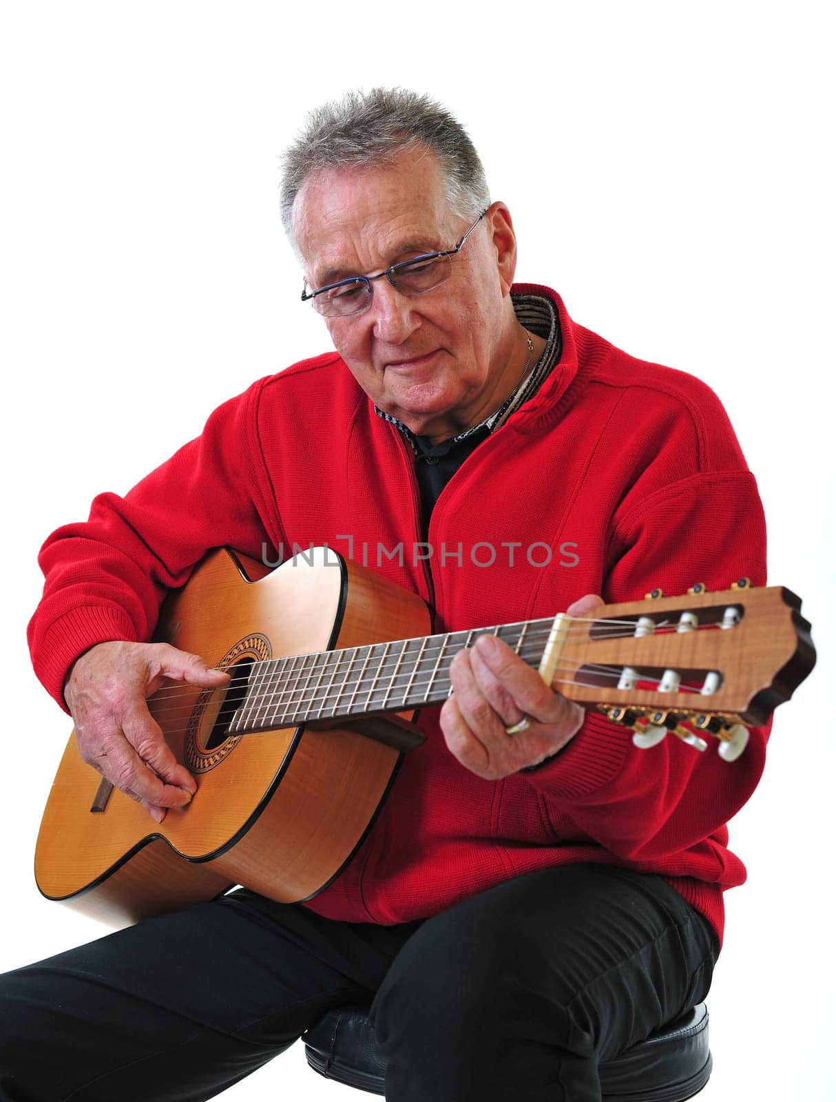 Retired pensioner plays guitar