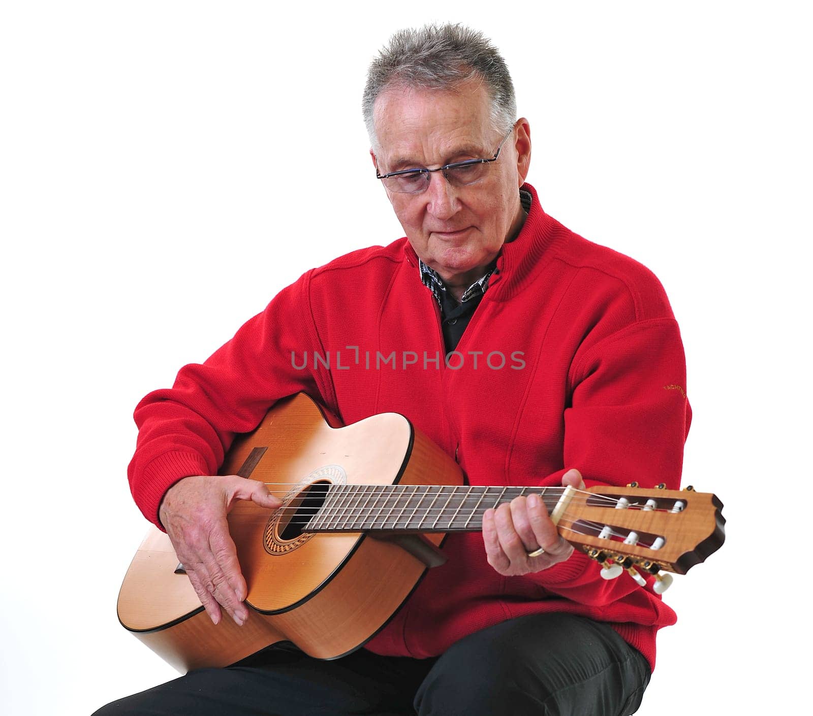 Retired pensioner plays guitar